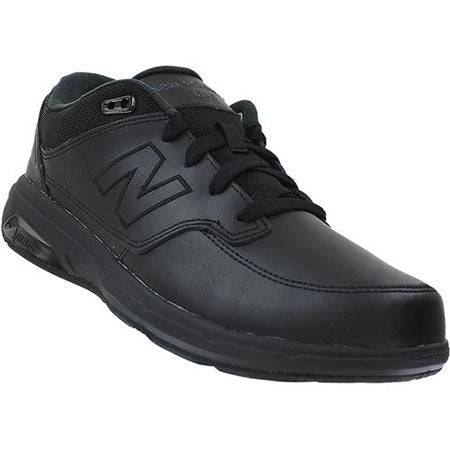 A black New Balance MW813BK walking shoe with lace-up front and logo on the side, displayed against a white background.