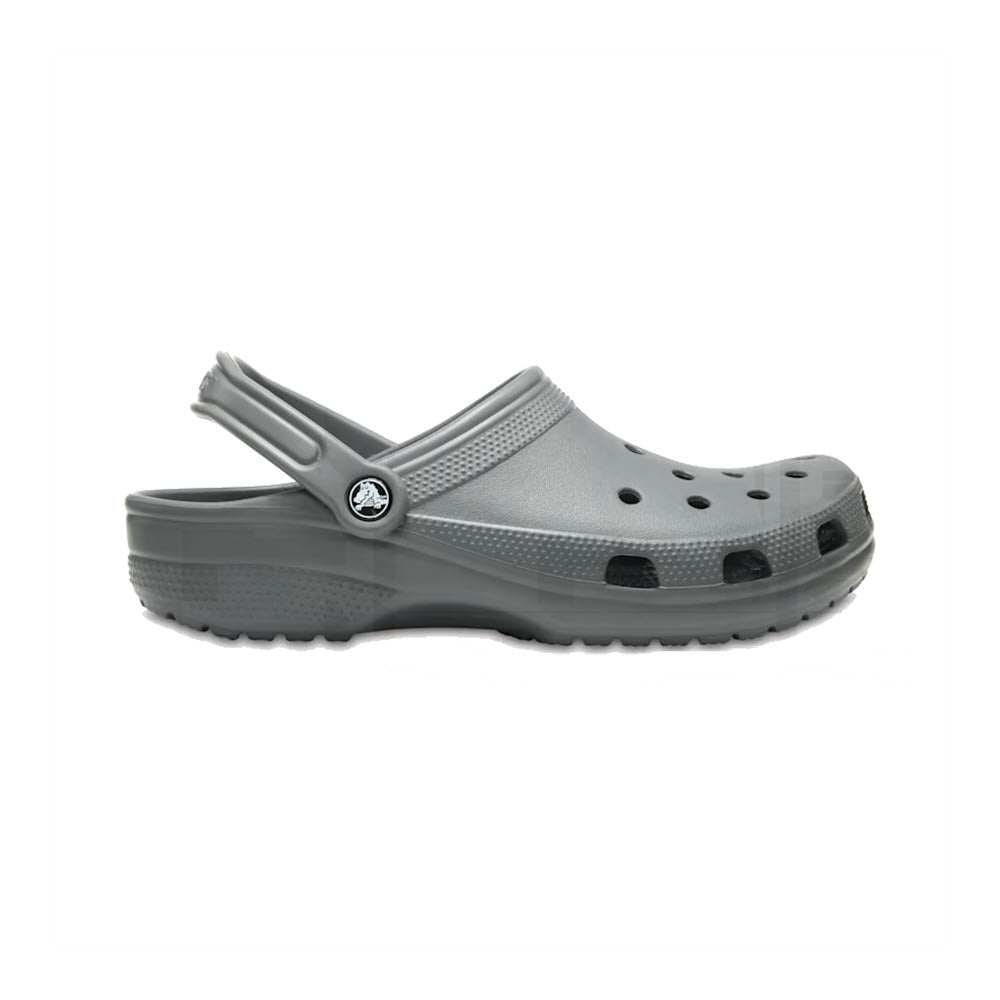 Gray Crocs Classic Clog crafted from Croslite material, with ventilation holes and a pivoting heel strap for a water-friendly design.