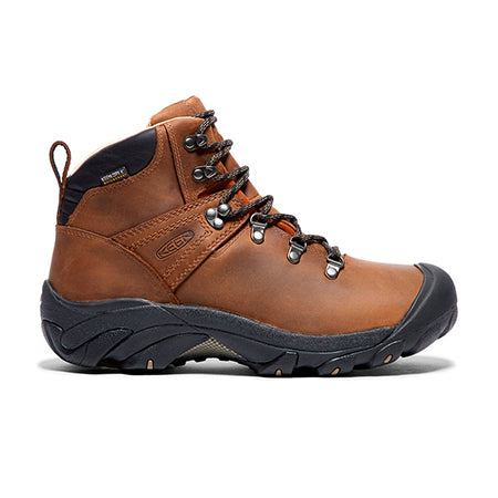 A single Keen Pyrenees Syrup - Mens hiking boot with black soles and metal lace eyelets, featuring a waterproof breathable membrane, isolated on a white background.