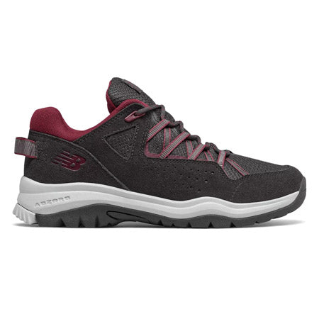Side view of a gray and burgundy New Balance 669V2 Phantom/Sedona trail walking shoe with a rugged sole and breathable upper design.