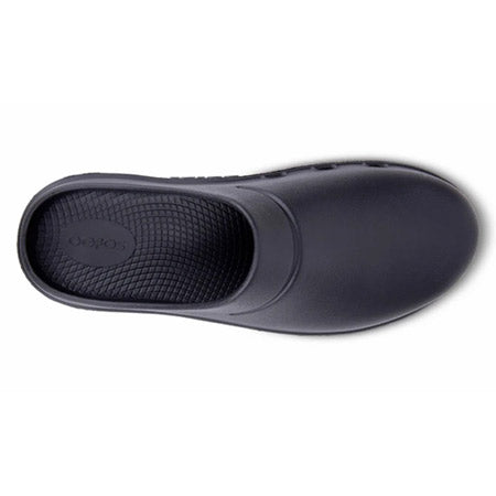 Top view of a single OOFOS OOCLOOG MATTE BLACK - WOMENS slip-on shoe by Oofos with a textured inner sole on a white background.