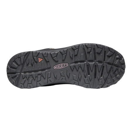Bottom view of a Keen Terradora II Black/Magnet - Women&#39;s hiking shoe sole with a patterned tread design featuring multi-directional lugs and Keen logo visible.