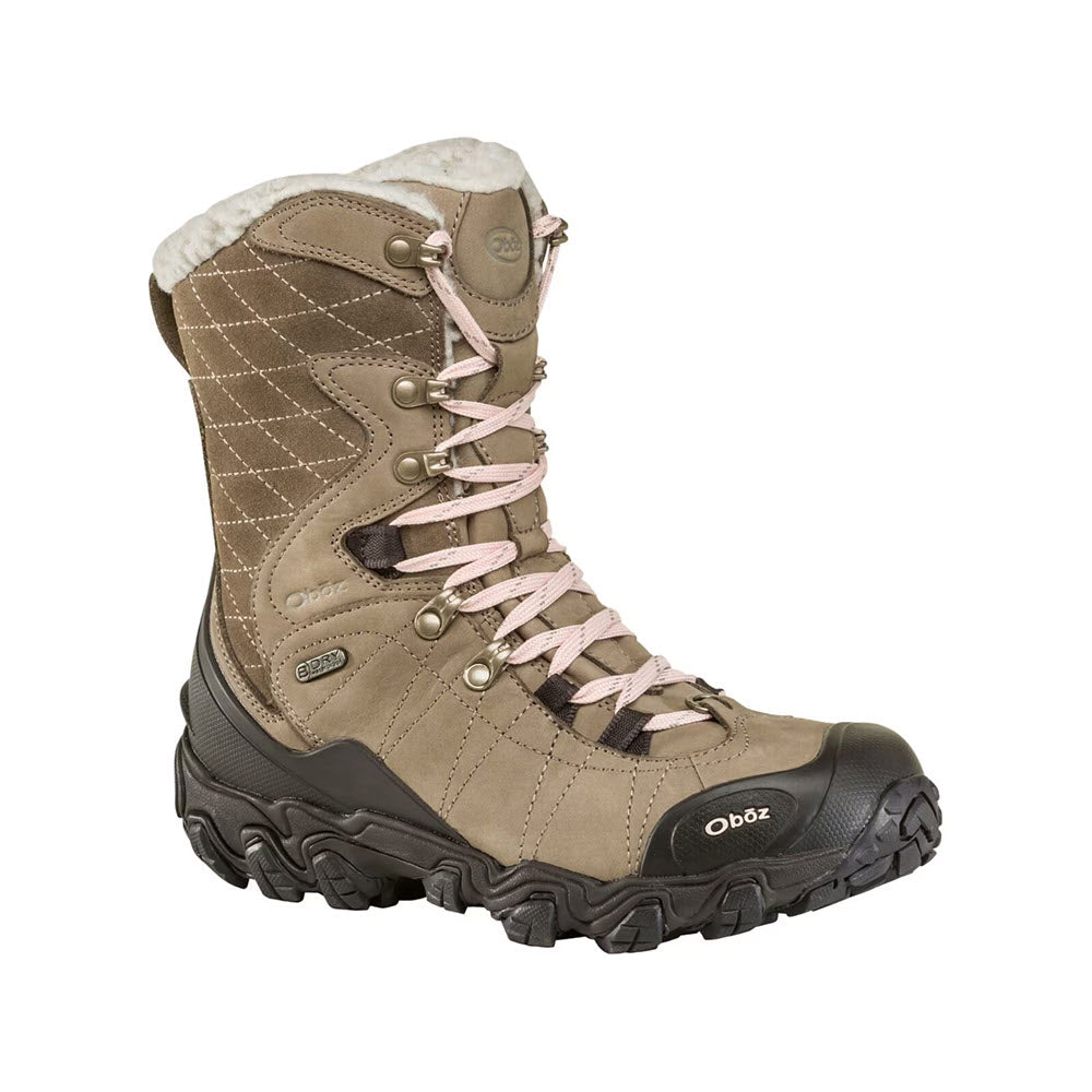 A single Oboz women&#39;s waterproof hiking boot featuring a high-top design with faux fur lining and contrasting pink laces on a white background.