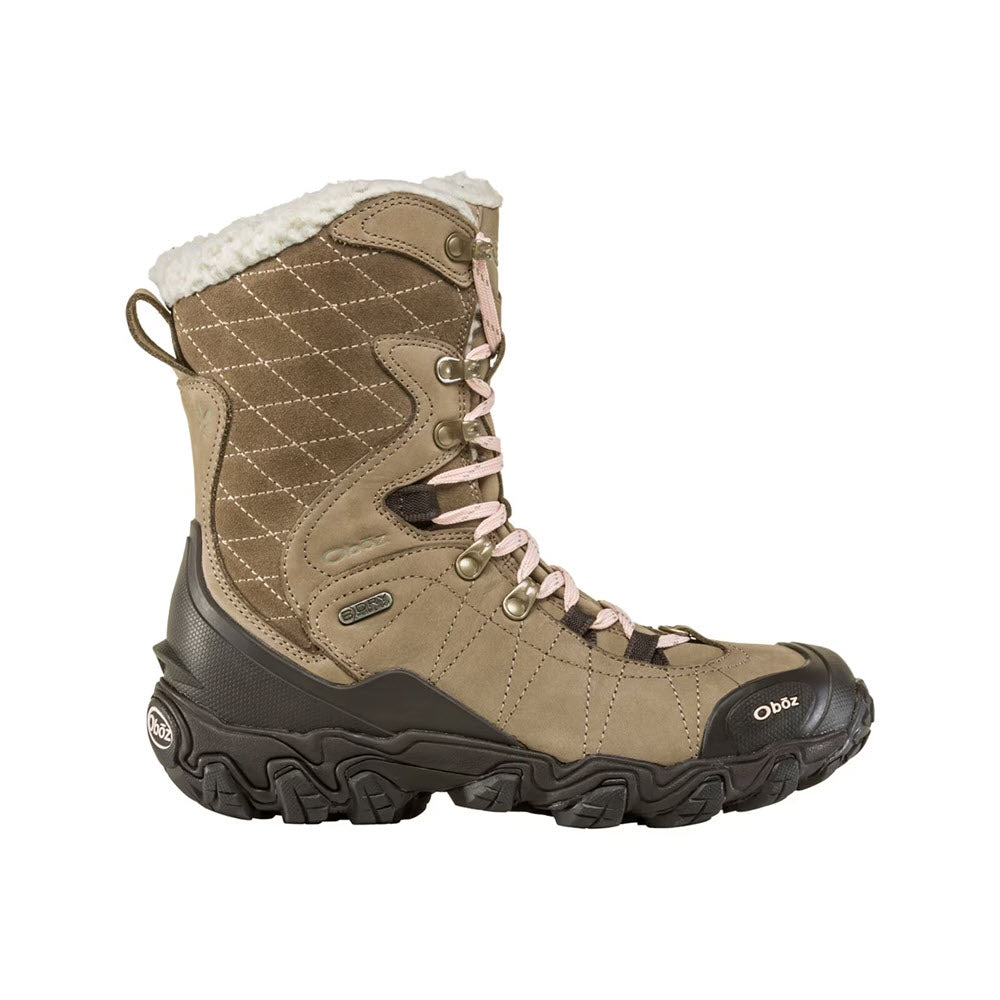 A single Oboz Bridger 9' Insulated BDRY Brindle - Womens waterproof winter boot with fuzzy lining and pink laces on a white background.