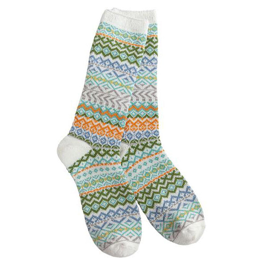 A pair of WORLDS SOFTEST STUDIO CREW SOCKS WINTER MOOD - WOMENS featuring a colorful geometric pattern on a white background by Worlds Softest.