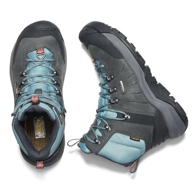 A pair of Keen Revel IV Mid Polar waterproof, grey and blue hiking boots with rugged soles, displayed from a top view, showing the laces and Keen logo.