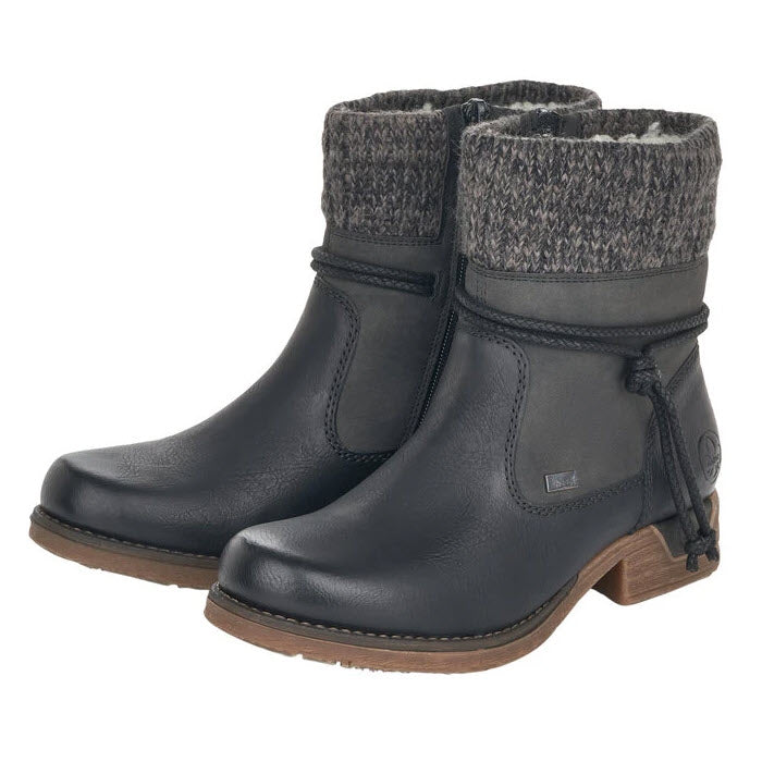 A pair of Rieker black leather ankle boots with a waterproof membrane and a knitted cuff design.