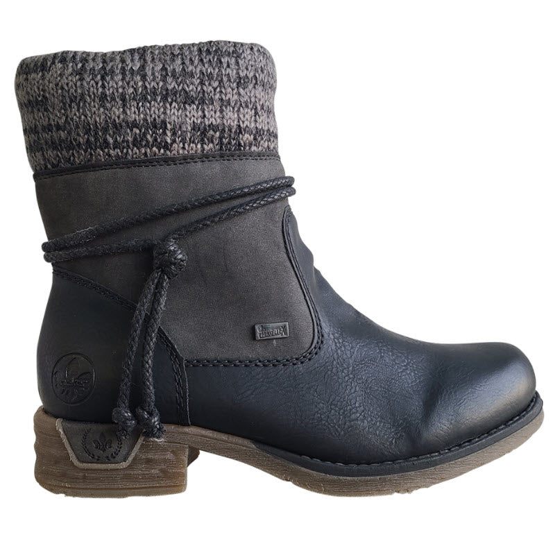 Women's Rieker Wool Lined Cuff Bootie with tie in black, made with vegan-friendly material, knitted cuff, and lace detail.