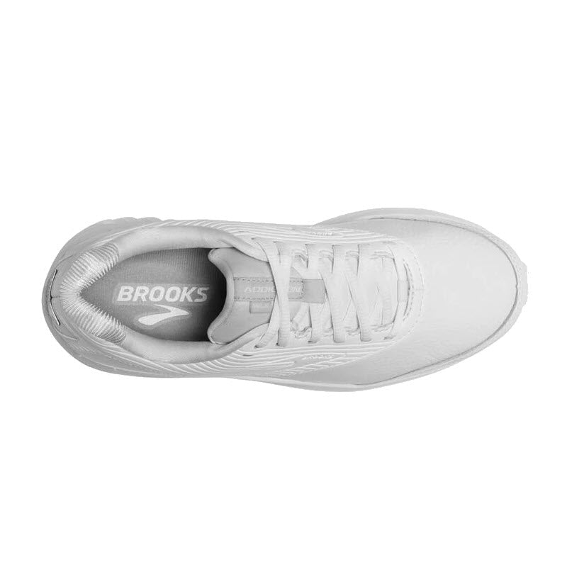 Top view of a single white Brooks Addiction Walker 2 Lace White - Women&#39;s walking shoe showing laces and brand label inside.
