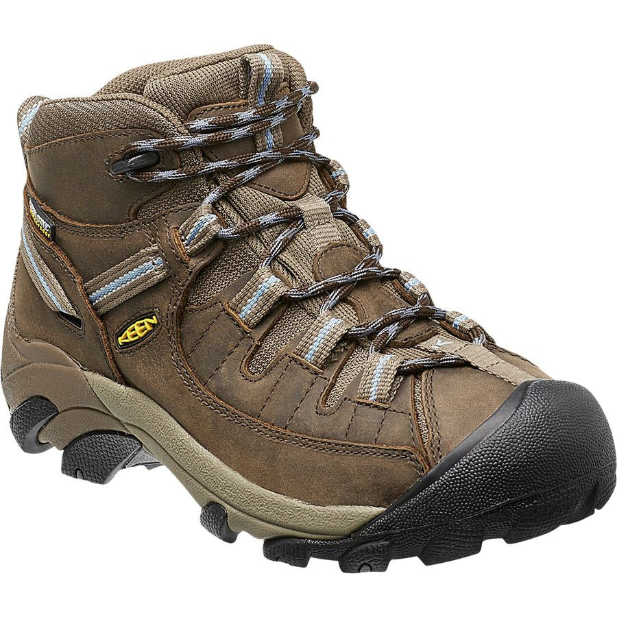 A single brown and black hiking boot with reinforced toe, rugged sole, and Keen.Dry waterproof lining.