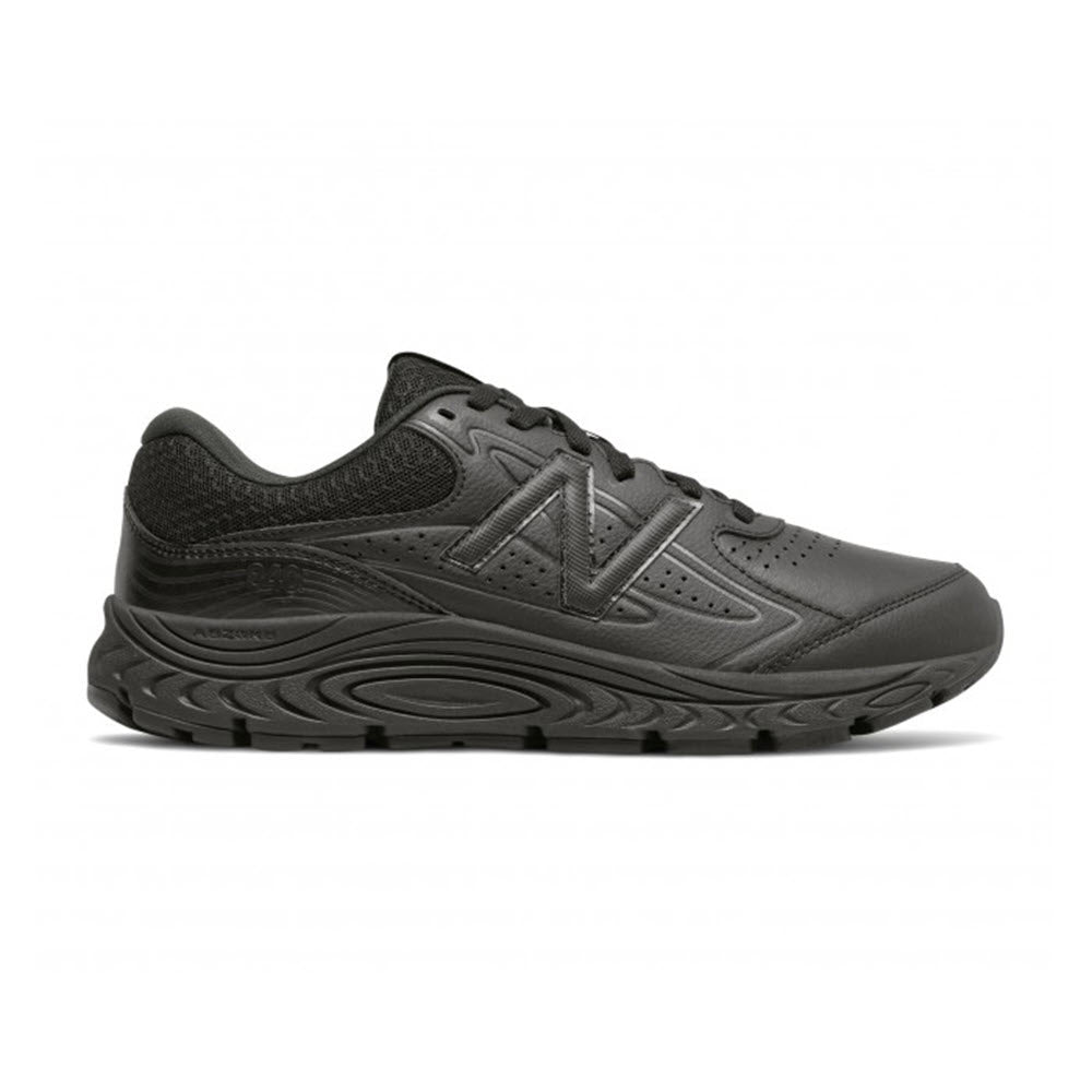 A side view of a black New Balance 840V3 men&#39;s walking shoe on a white background.