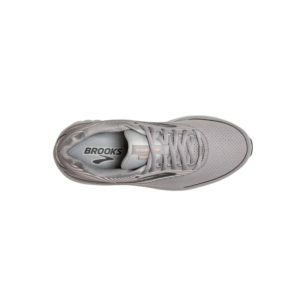 Top view of a single gray Brooks Addiction Walker Suede Alloy/Oyster/Peach - Womens walking shoe showing laces and inner sole details.