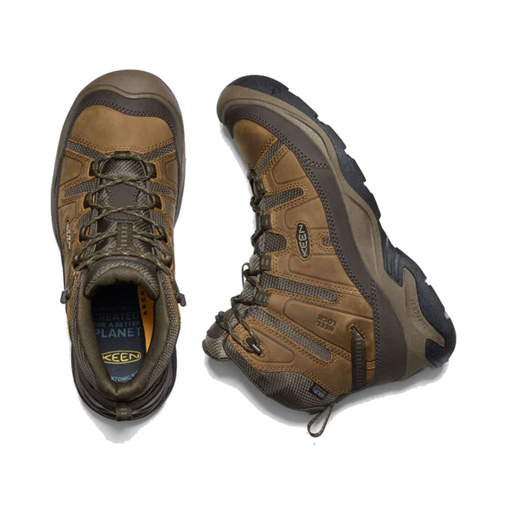 A pair of brown KEEN CIRCADIA MID WATERPROOF BISON - MENS hiking boots with KEEN.DRY waterproof membrane and laces, featuring logos and labels, displayed on a white background.