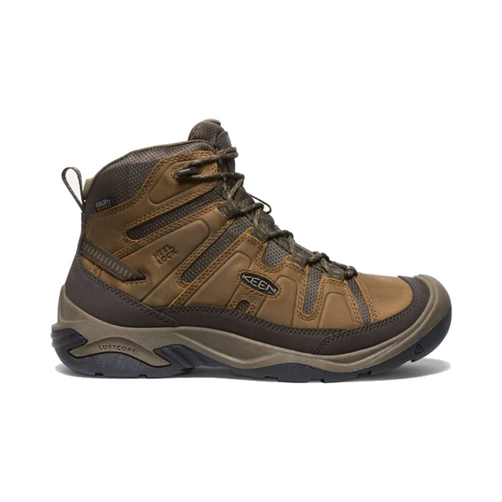 A single brown hiking boot with a high ankle and a grooved sole, featuring Keen.Circadia Mid waterproof bison - mens membrane and lace-up closure.