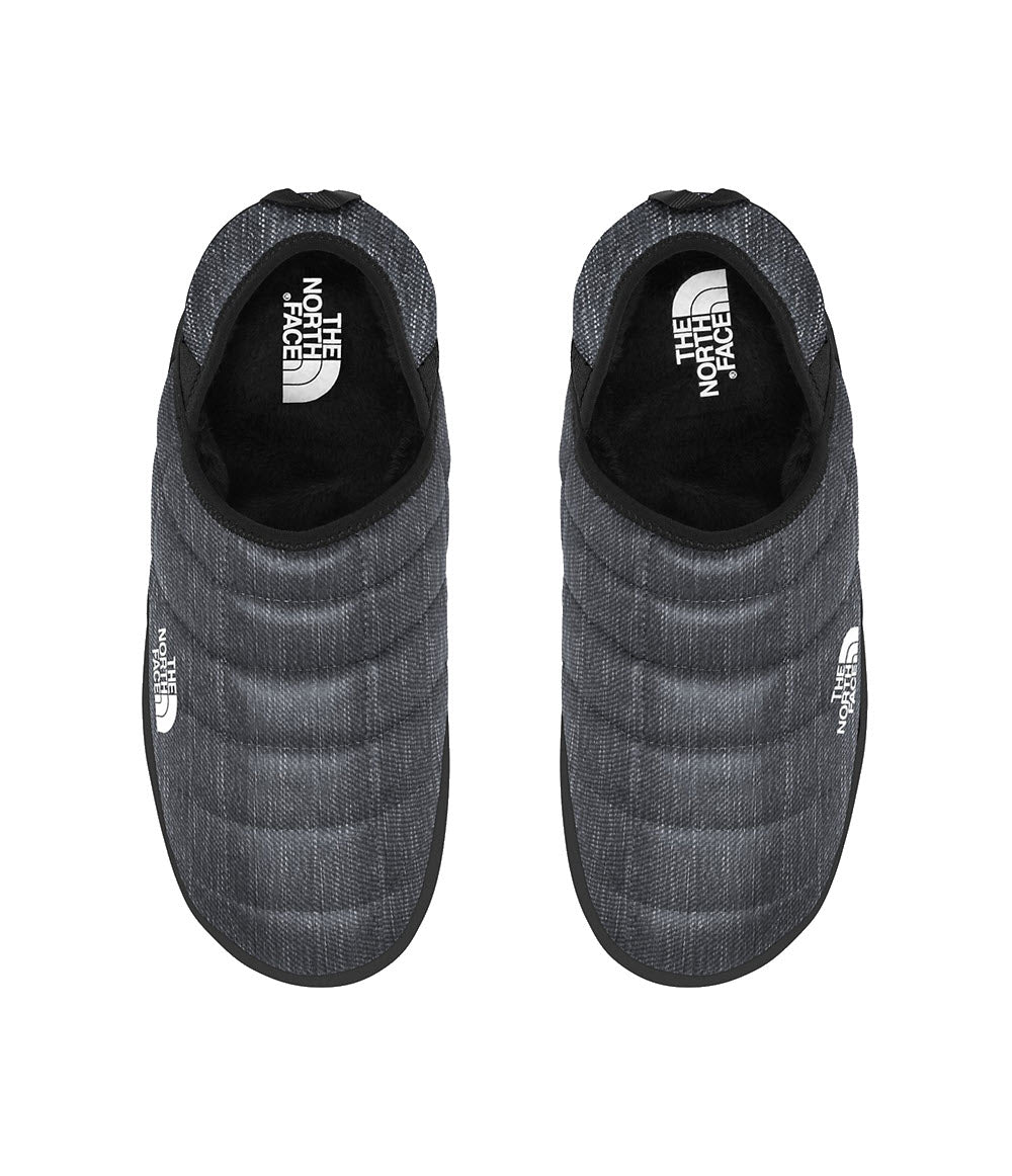 A pair of North Face THERMOBALL MULE V PHANTOM GREY HEATHER slip-on shoes, featuring a textured upper fabric and white logos on the heel and tongue.