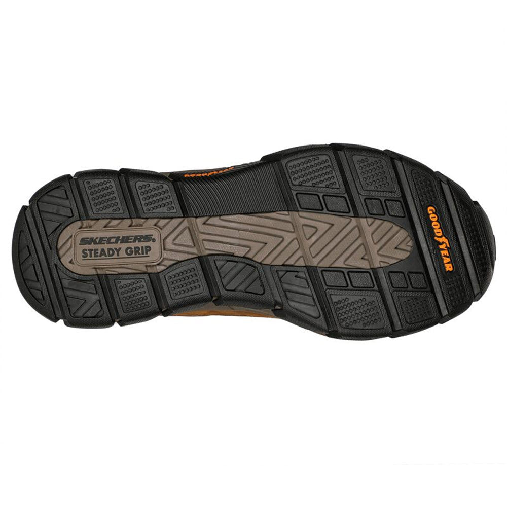 Bottom view of a Skechers Boswell Dark Brown work shoe with a black and brown &quot;steady grip&quot; slip-resistant sole, featuring Goodyear rubber and intricate tread design.