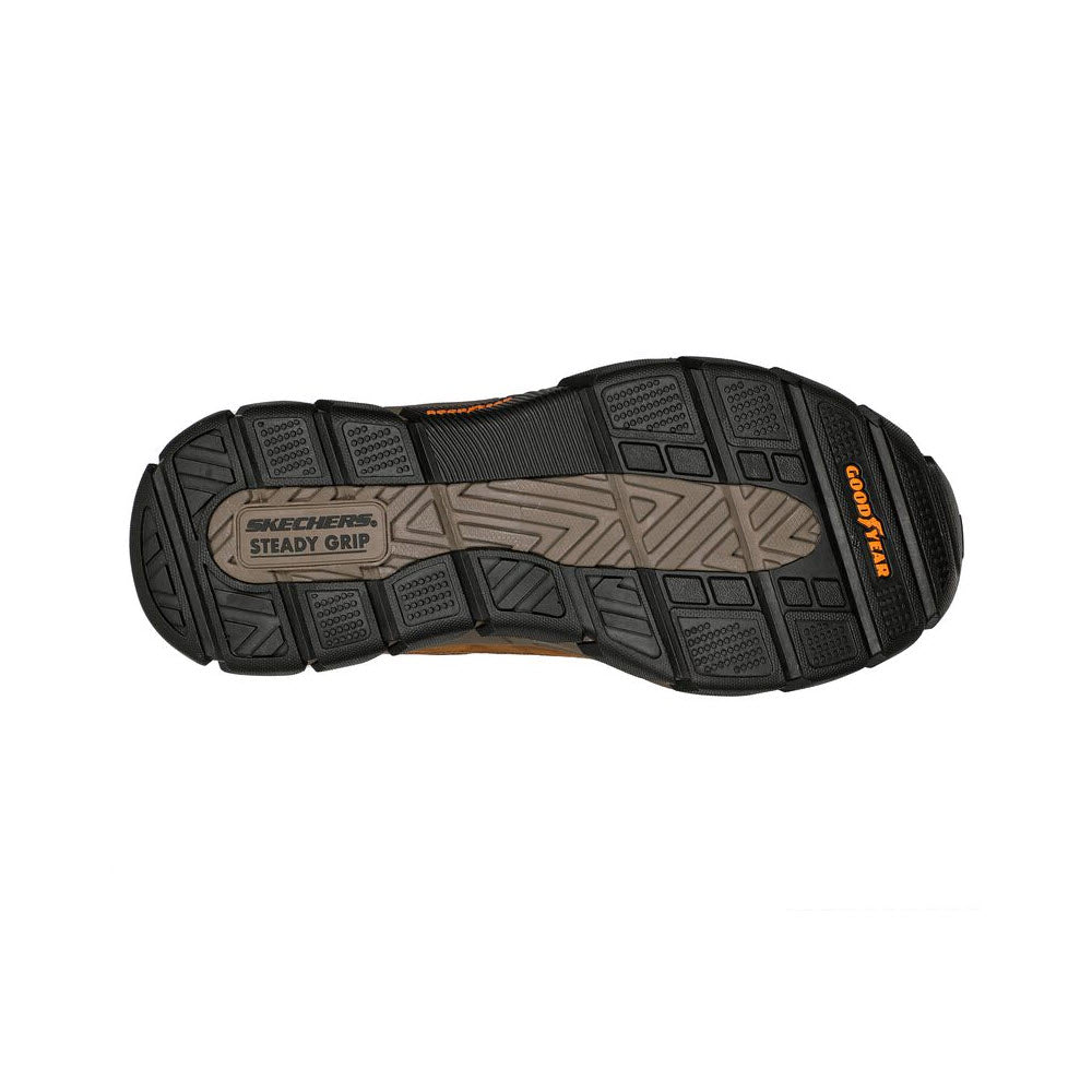 Bottom view of a Skechers Boswell Dark Brown - Mens work shoe displaying a black sole with steady grip design and orange accents.