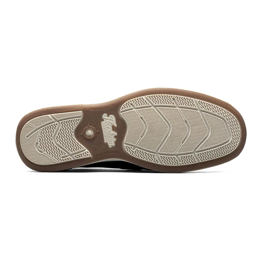 Sole of a brown and white Florsheim Lakeside Slip On Canvas Navy - Mens shoe showing tread pattern and brand logo.