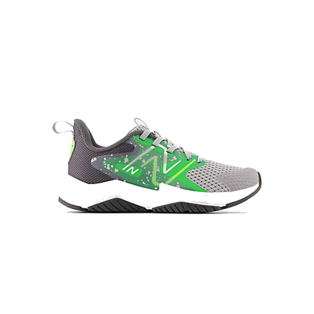 Kids' New Balance Rave Run 2 Raincloud/Green running shoe with a bold design, featuring a textured sole and a prominent brand logo on the side.