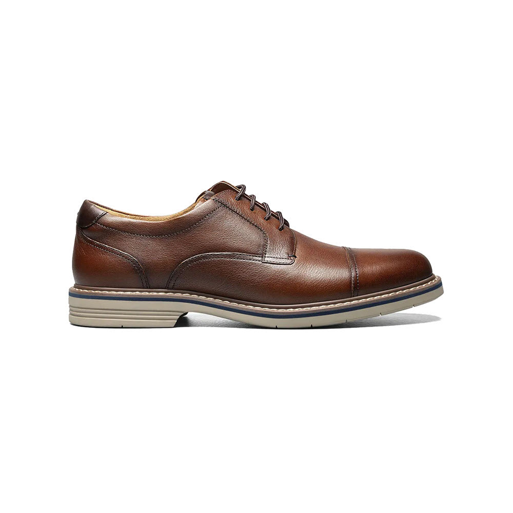 A Florsheim Norwalk plain toe Crazy Horse leather Oxford with laces and a light-colored sole on a white background.