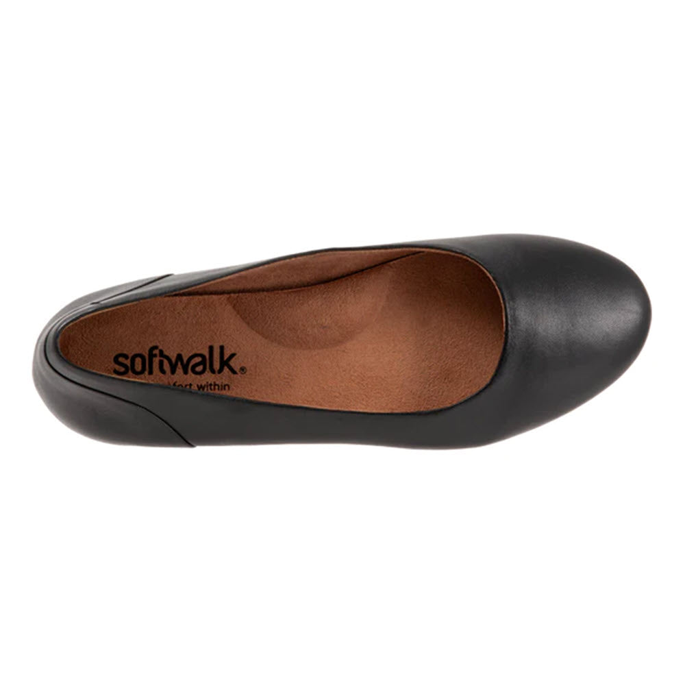 Top view of a black leather Softwalk Shiraz flat shoe with a brown insole and visible brand name &quot;softwalk&quot; inside.