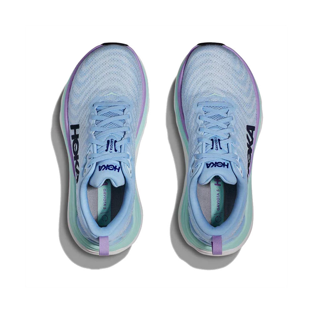 A pair of HOKA Gaviota 5 Airy Blue/Sunlit Ocean stability running shoes displayed from above, featuring a light blue and white color scheme with purple accents.