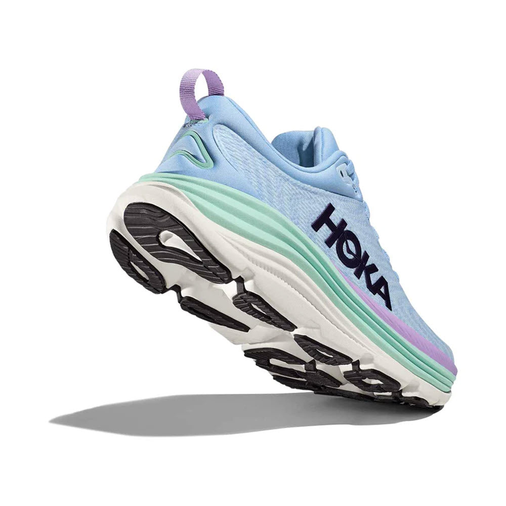 A Hoka Gaviota 5 stability running shoe with an Airy Blue and Sunlit Ocean upper and a thick, black and white treaded sole, isolated on a white background with a visible shadow.
