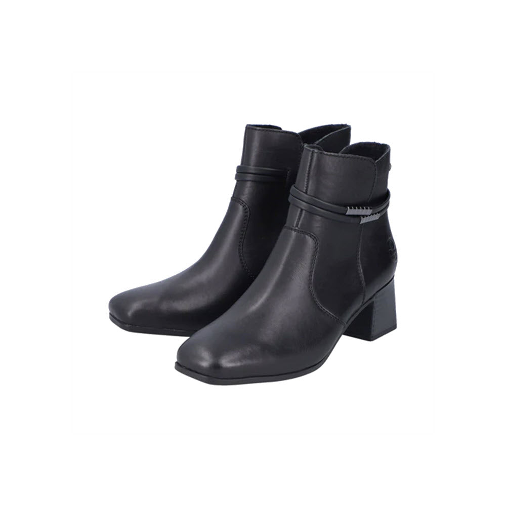 RIEKER BLOCK HEEL DRESS BOOTIE BLACK LEATHER - WOMENS with a short heel, decorative strap detailing around the ankle, and anti-stress insoles for added comfort.