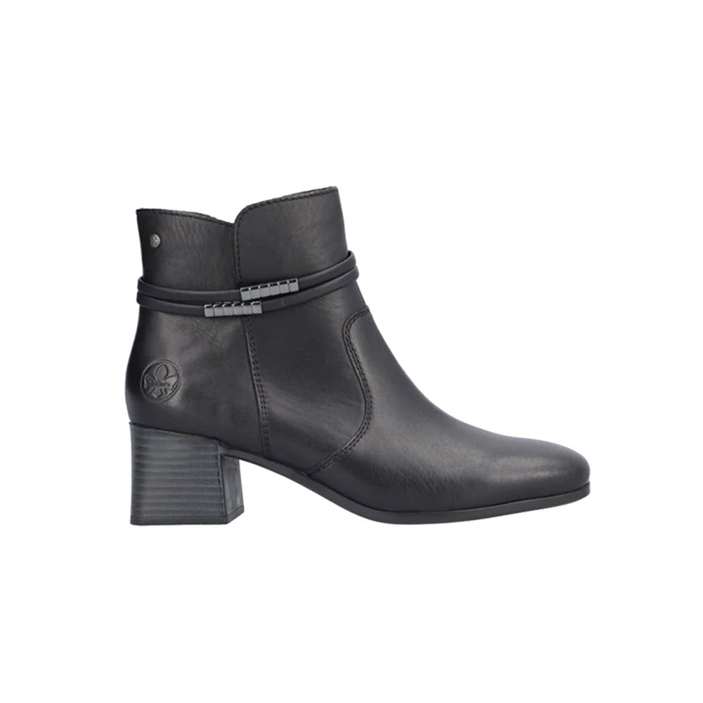 RIEKER BLOCK HEEL DRESS BOOTIE BLACK LEATHER - WOMENS by Rieker with a low, block heel and anti-stress insoles, featuring a small emblem on the outer side and a decorative strap around the top.
