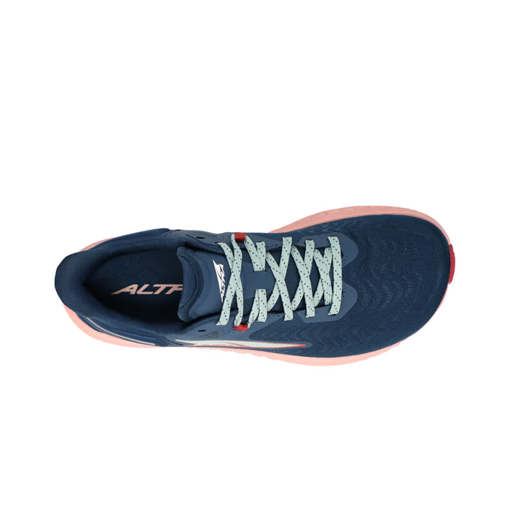 Top view of a single blue and pink Altra Torin 7 Deep Teal/Pink running shoe with white laces on a white background.