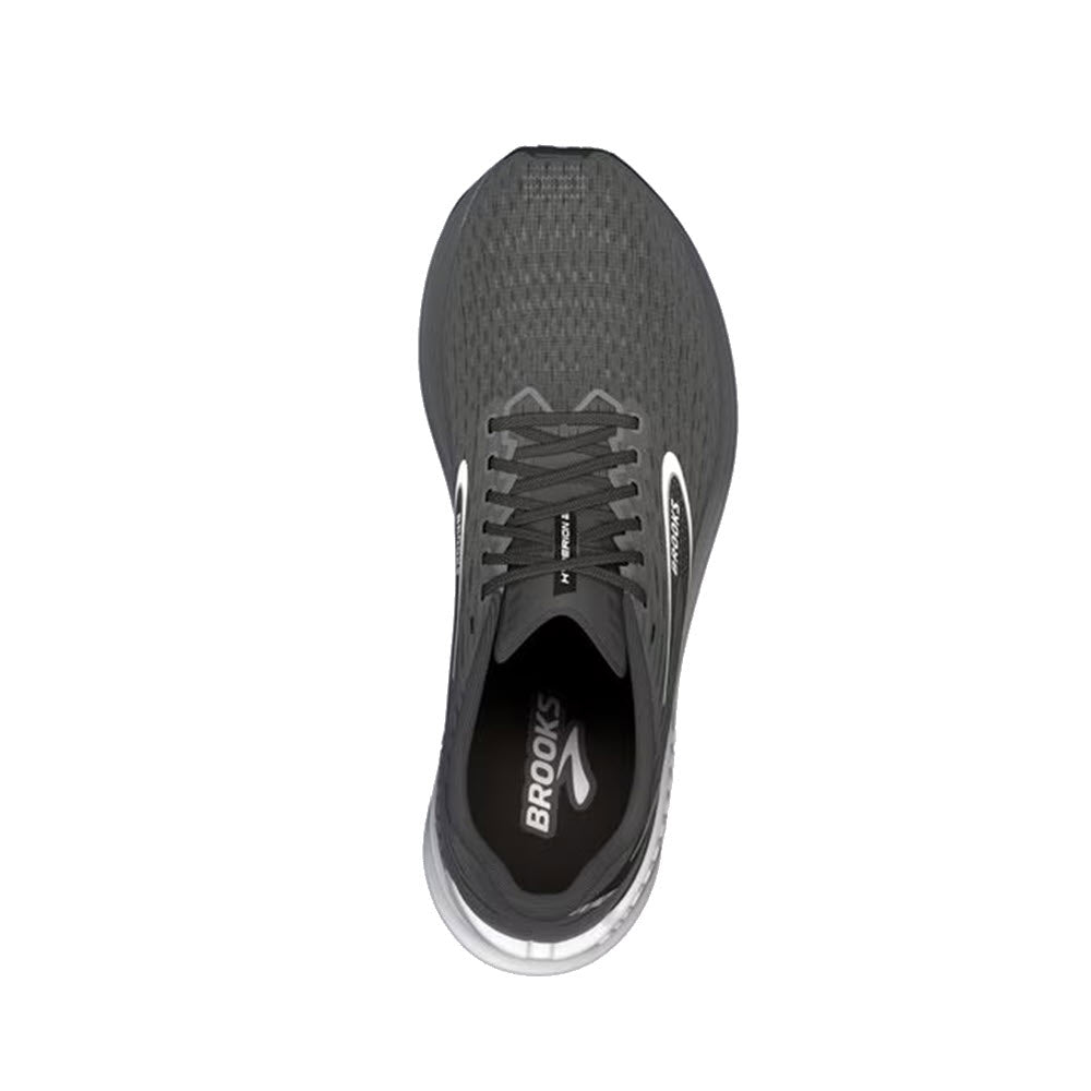 Top view of a gray Brooks Hyperion GTS Gunmetal/Black/White running shoe with white laces and logo, focusing on the textured upper and the interior branding.