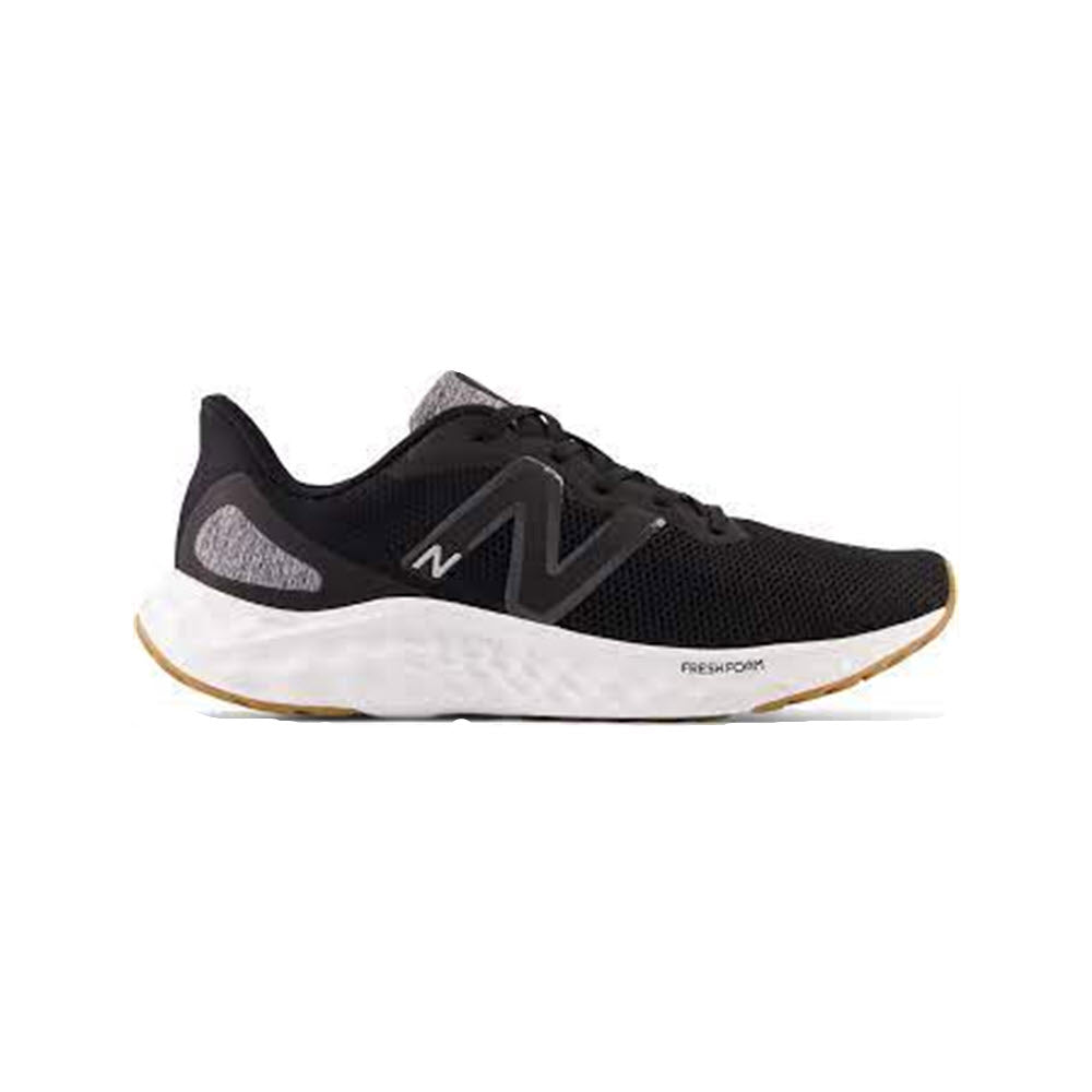 Sentence with replacement: Black and white New Balance Fresh Foam Arishi v4 running shoe with a breathable mesh upper and thick white sole, displayed on a plain white background.