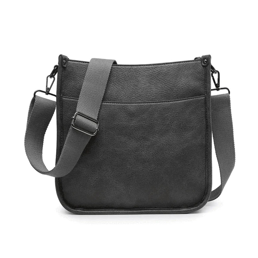 Jen &amp; Co. black vegan leather Posie crossbody bag with an adjustable gray strap, displayed against a white background.
