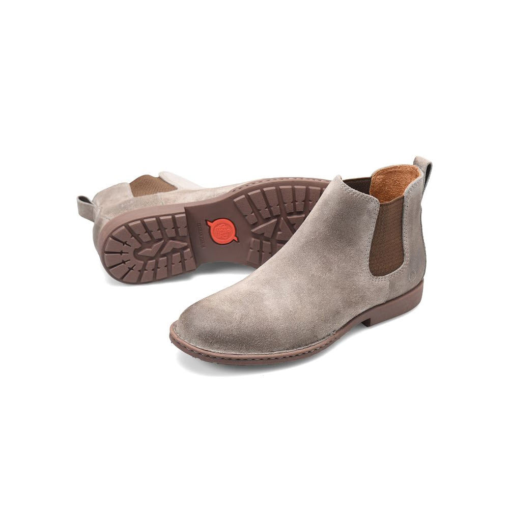 A pair of BORN SHANE CHELSEA BOOT SUEDE TAUPE - MENS with brown soles, displayed on a white background.