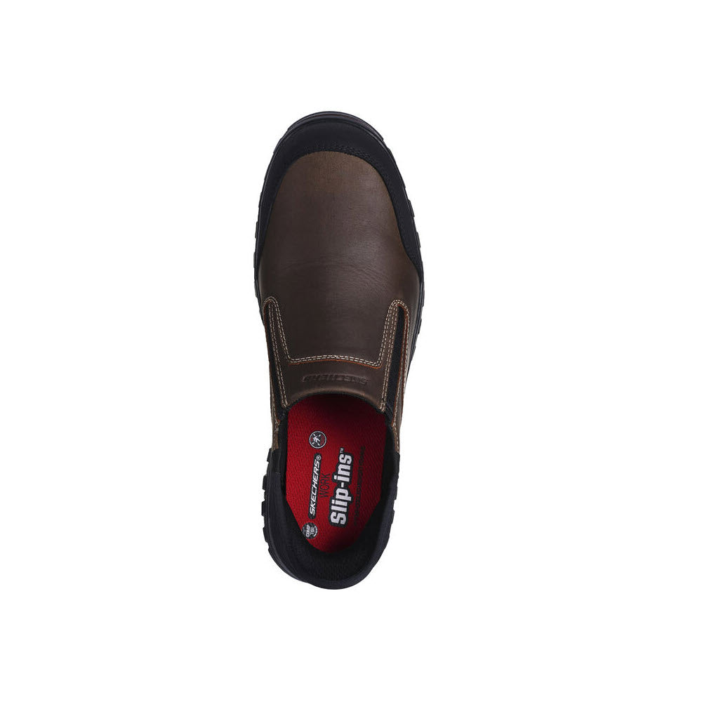 Top view of a brown leather Skechers Loeman Hands Free Slip-ins shoe with visible stitching and a red logo on the insole.