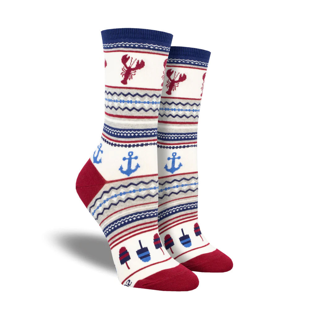 A pair of Socksmith Lobster Fair Isle crew socks featuring red anchors, blue ships, and lobsters on a striped white background, with blue and red accents at the toes, heels, and cuffs.