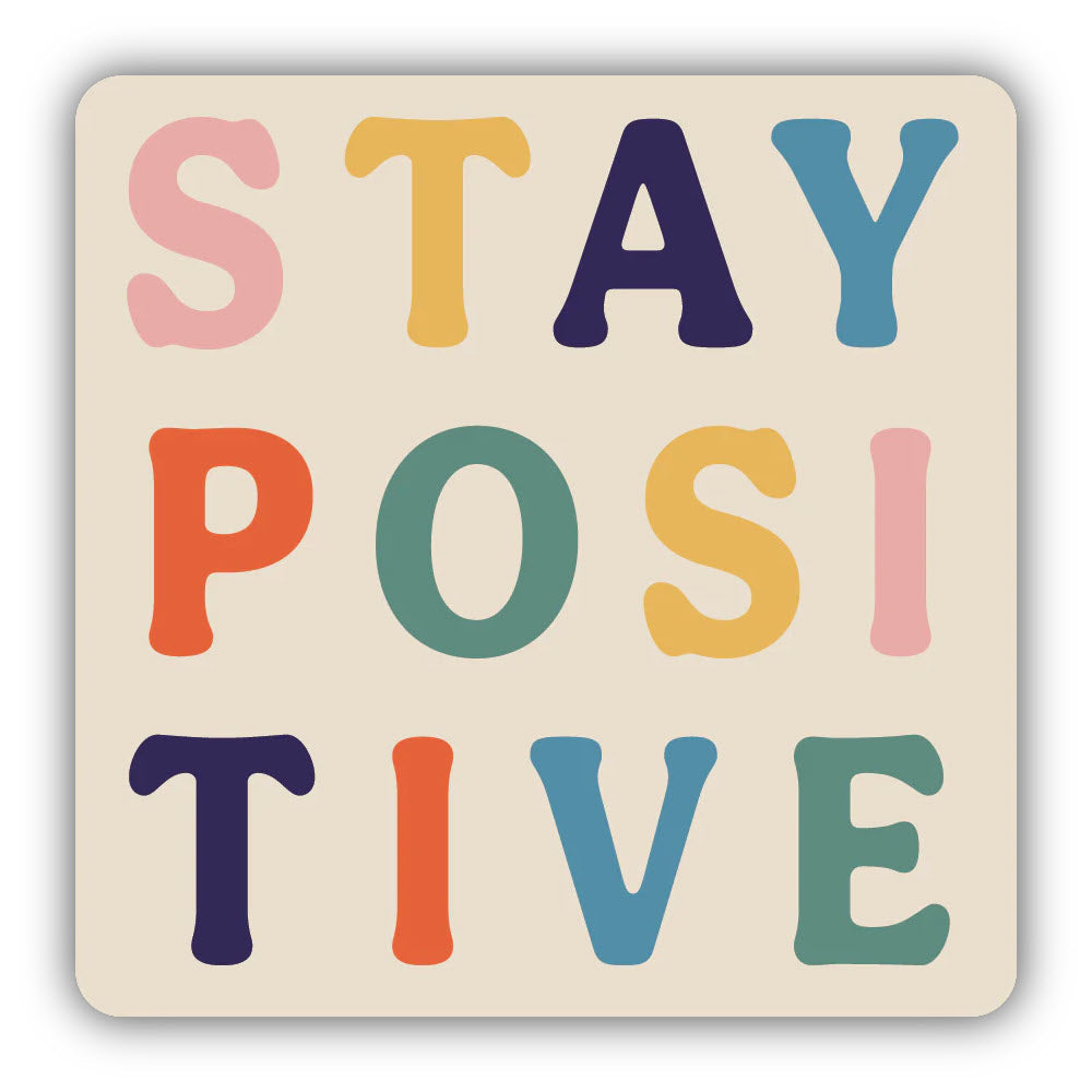 Graphic square STICKERS NORTHWEST STAY POSITIVE with the phrase "stay positive" in colorful block letters on a light beige background, weatherproof and Made in the USA.