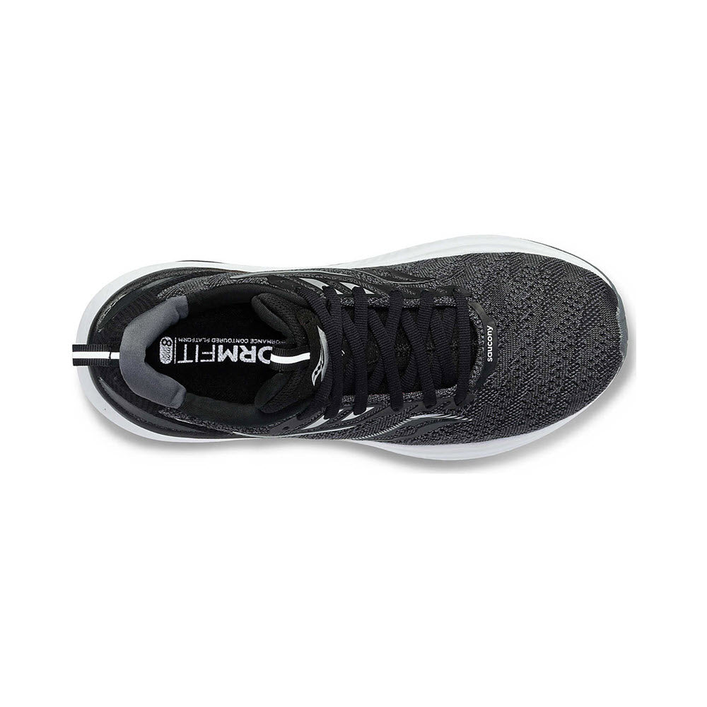 Top view of a black and gray comfort shoe with laces, featuring the &quot;Saucony&quot; logo on the insole.