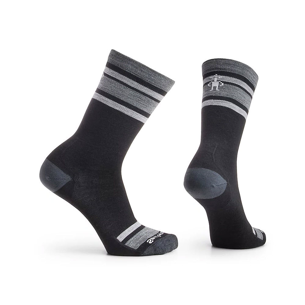 A pair of gray Smartwool Top Split Crew Black/Charcoal socks with white and black stripes, displayed in a standing position on a white background.
