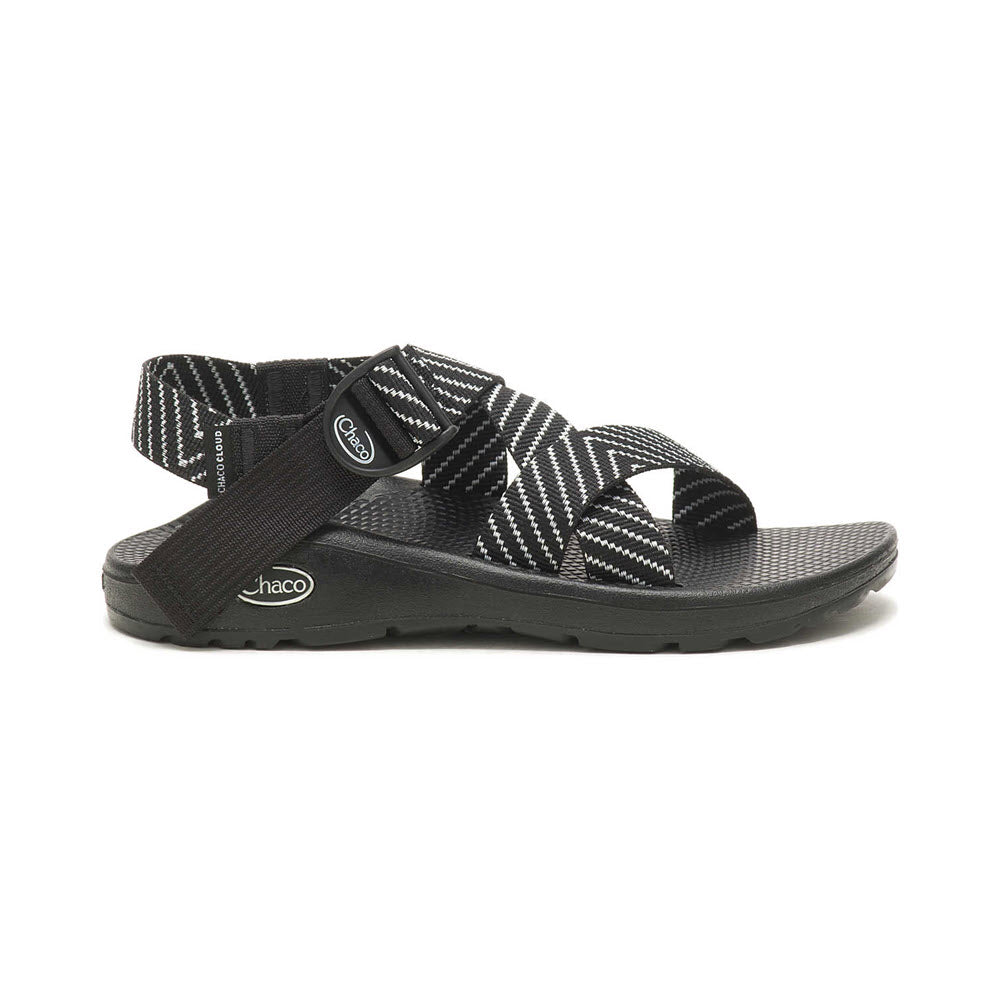 A single CHACO MEGA Z/CLOUD VIBIN B+W - WOMENS sandal with crisscross straps and a ChacoGrip rubber outsole, photographed on a white background.