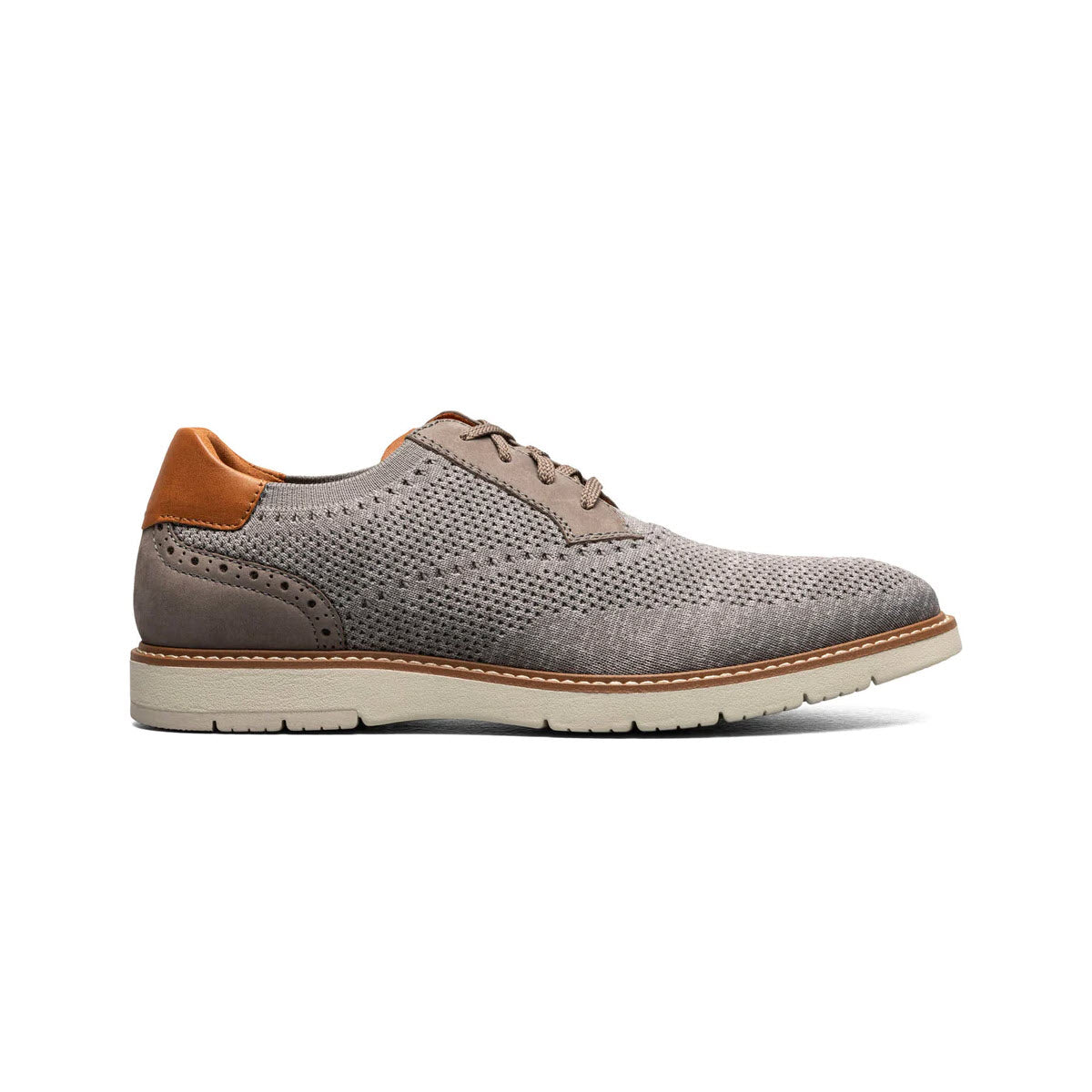 A single Florsheim Vibe Knit Plain Toe Oxford Gray shoe with perforated detailing and a brown leather heel tab, displayed against a white background.
