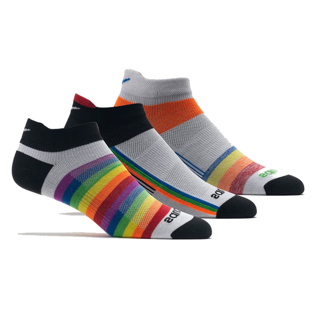 Three pairs of Saucony Inferno Ultralight No Show Tab 3 Pack Multi running socks with rainbow stripes, displayed vertically in black, gray, and white backgrounds.