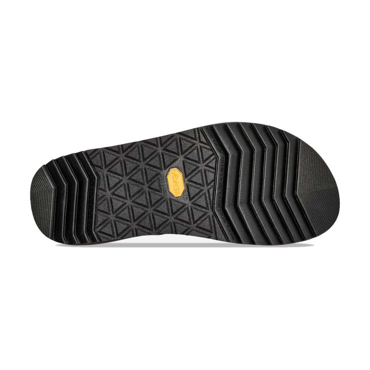 Sole of a Teva shoe featuring a geometric tread pattern and a small, rectangular yellow logo in the center, upgraded with a Vibram® Megagrip outsole.