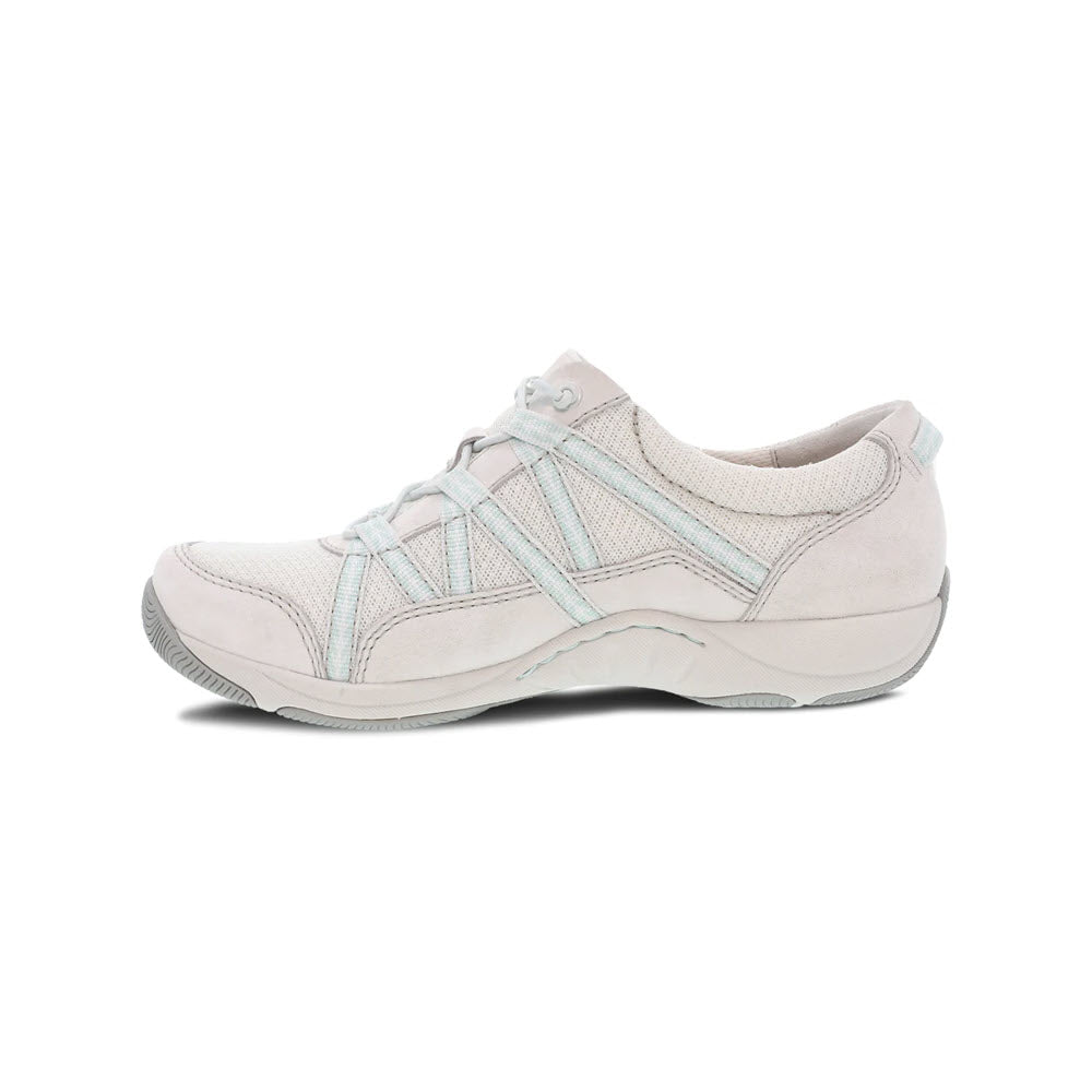 A single Dansko Harlyn Ecru sneaker with blue accents, designed for lightweight performance, displayed in profile against a white background.