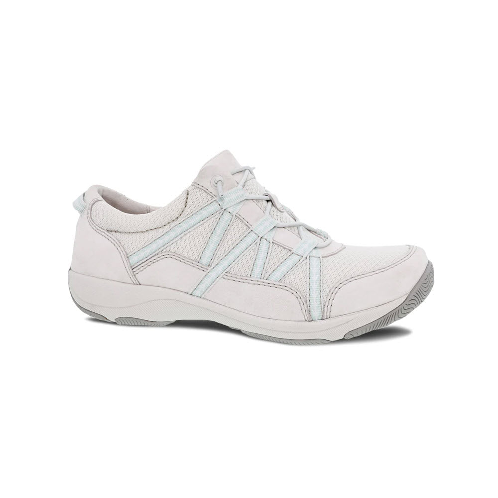 A single Dansko Harlyn Ecru women&#39;s athletic sneaker with blue crisscross laces and mesh panels, viewed from the side on a white background.