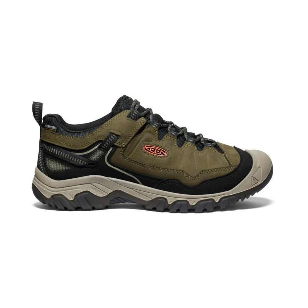 A single dark olive green, durable Keen Targhee IV WP hiking shoe with black and gray accents, displayed against a white background.