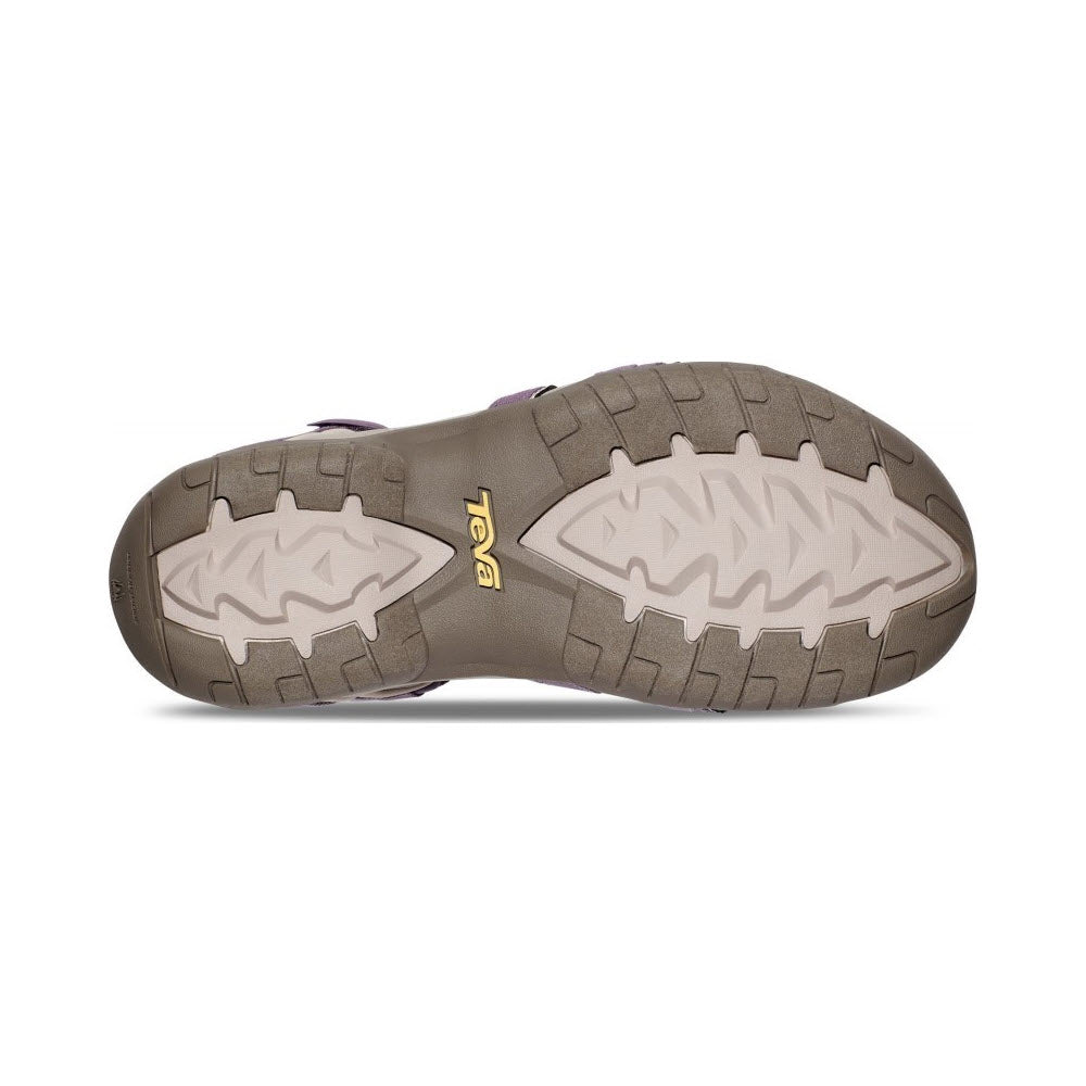 Sole of a women&#39;s Teva Tirra Grey Ridge hiking boot with tread pattern highlighted in light gray and brand logo visible.