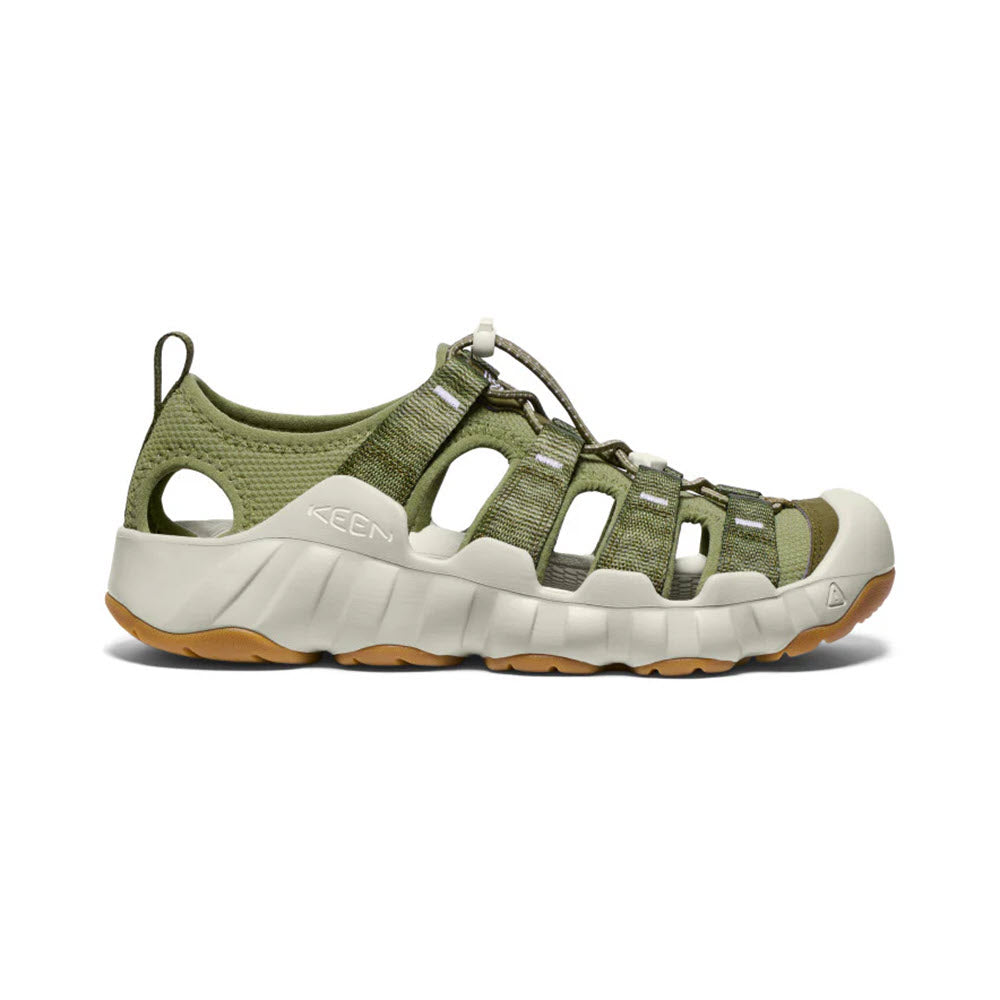 Side view of a green and beige Keen Hyperport H2 Martini Olive Plaza Taupe - Mens hiking sandal featuring maximal cushioning on a white background.