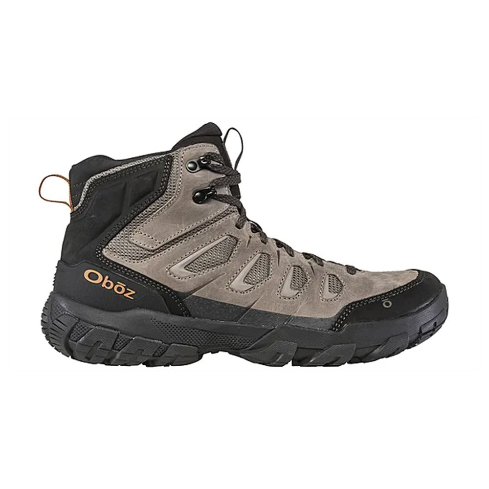 A single OBOZ SAWTOOTH X MID ROCKFALL hiking boot in gray with black and orange accents, featuring a high ankle design and rugged sole.