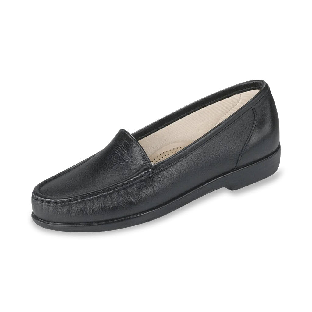 A single SAS SIMPLIFY BLACK - WOMENS leather loafer shoe with a low heel and rounded toe, displayed on a white background. This shoe features a cushioned footbed for added comfort.